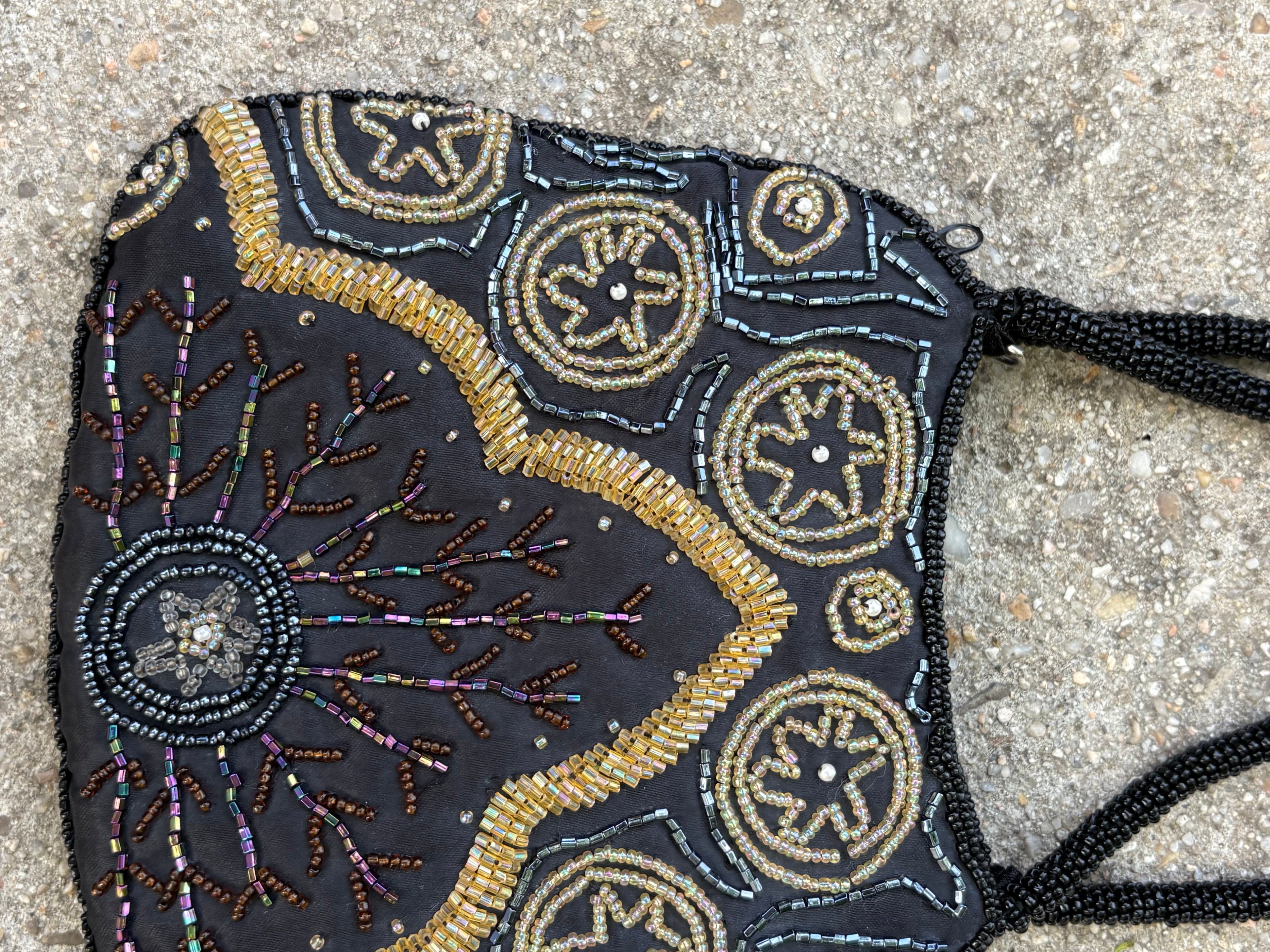 Bolso joya pedrería mano