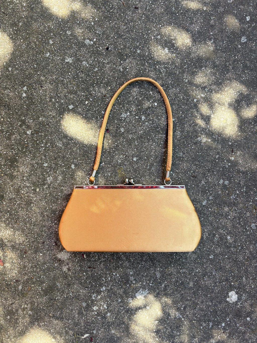 Bolso clutch ocre