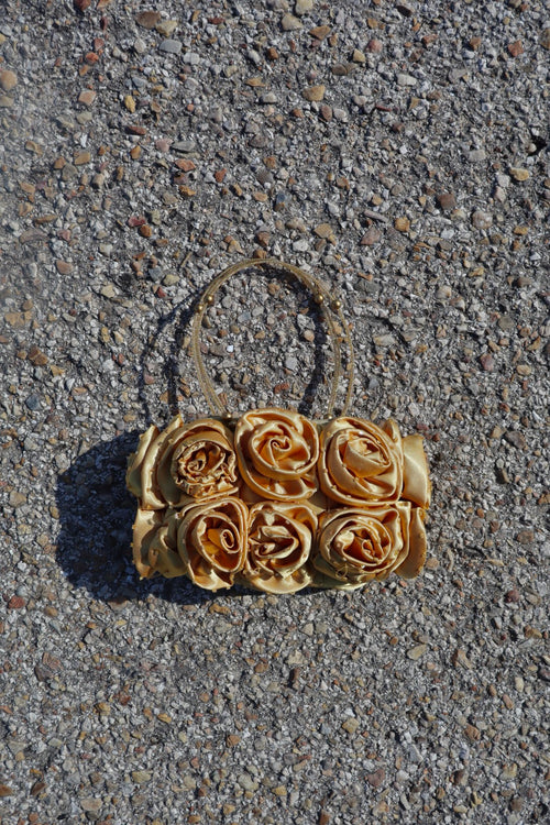 Bolso dorado flores pedrería