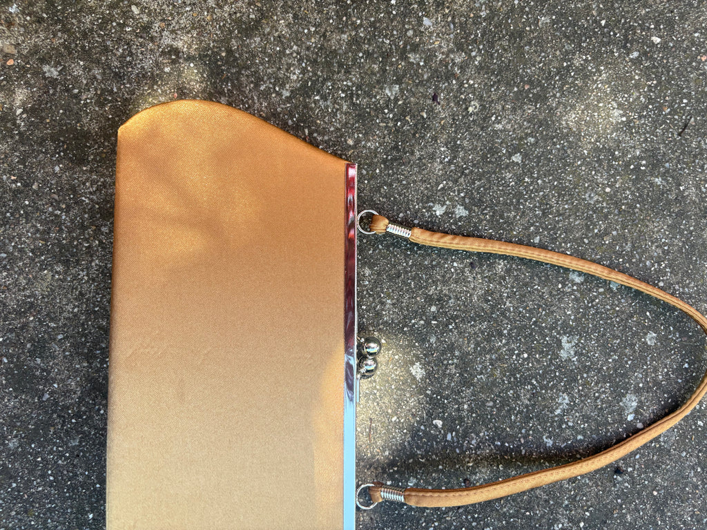 Bolso clutch ocre