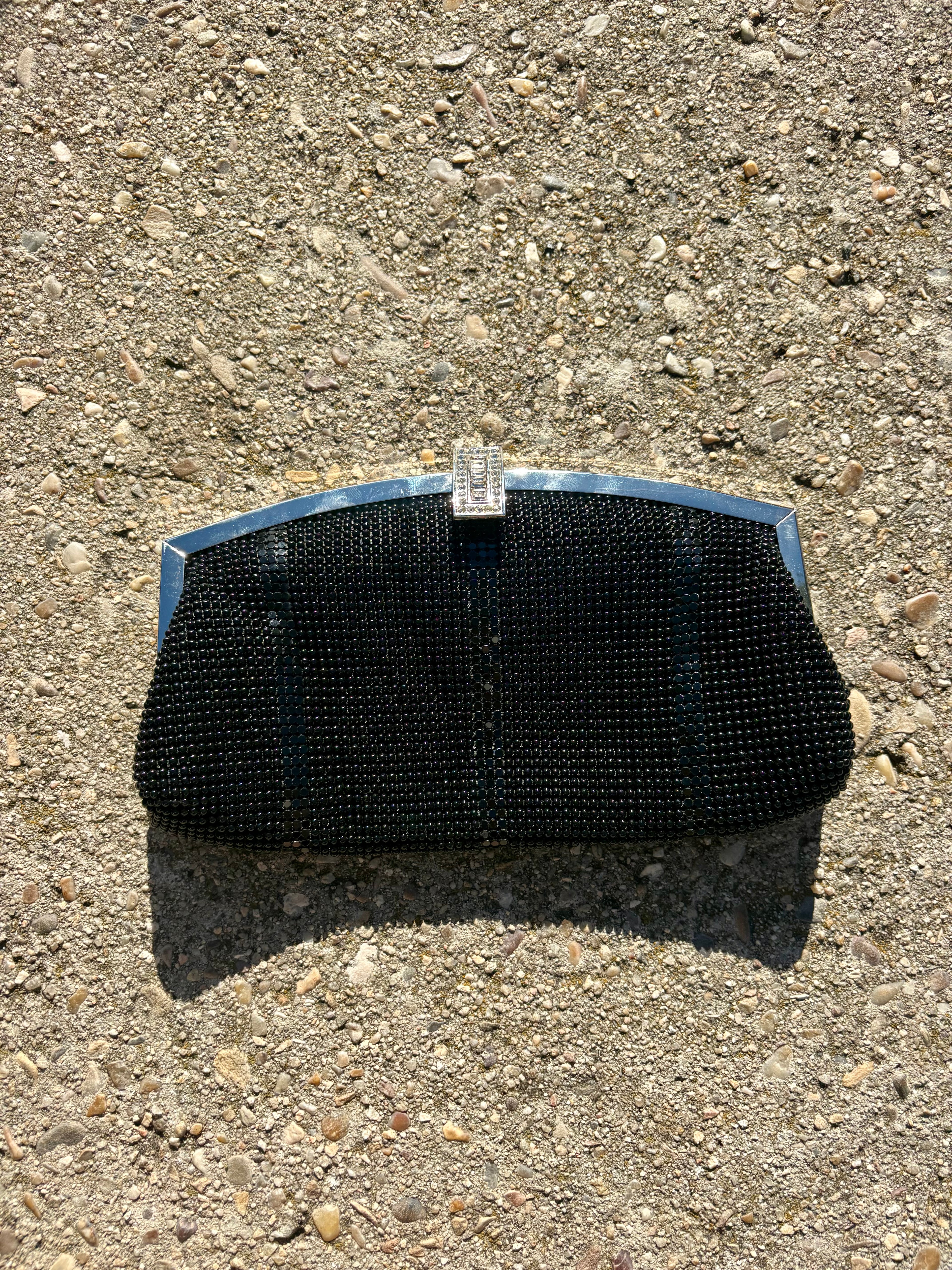 Clutch negro con cadena