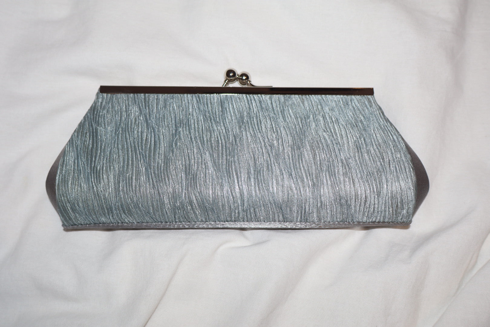 Clutch cartera plata