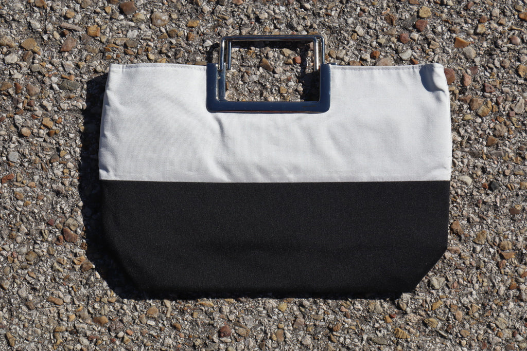 Bolso de mano negro y blanco