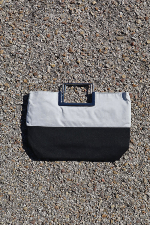 Bolso de mano negro y blanco